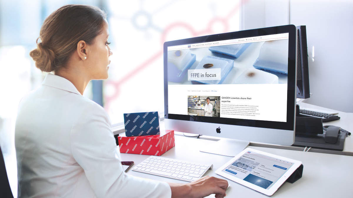 woman working in front of computer