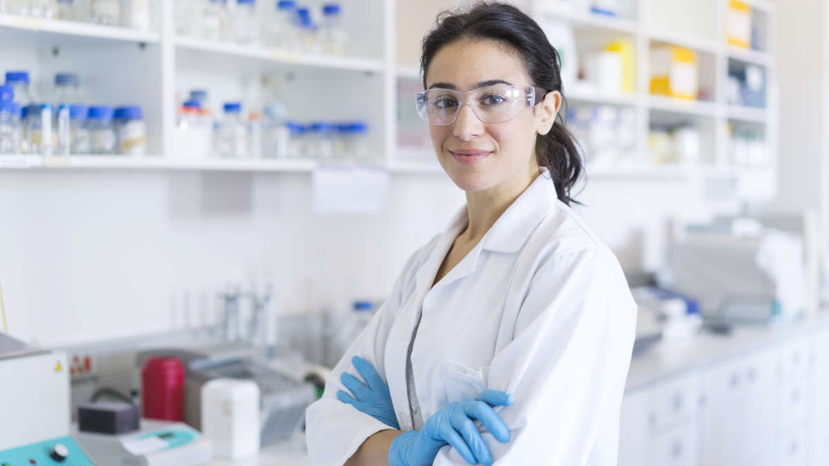 Long range without lthe ong wait, Smiling female scientist